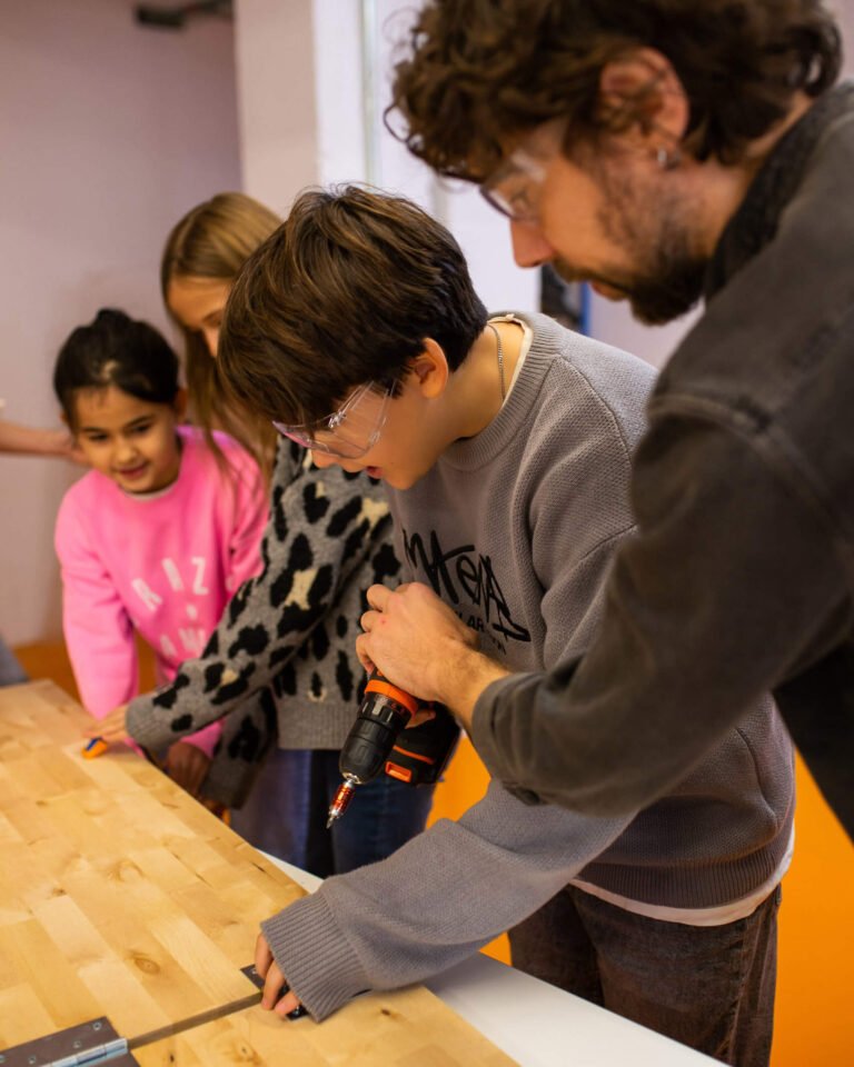 learnlife village hub learners in carpentry studio 768x960